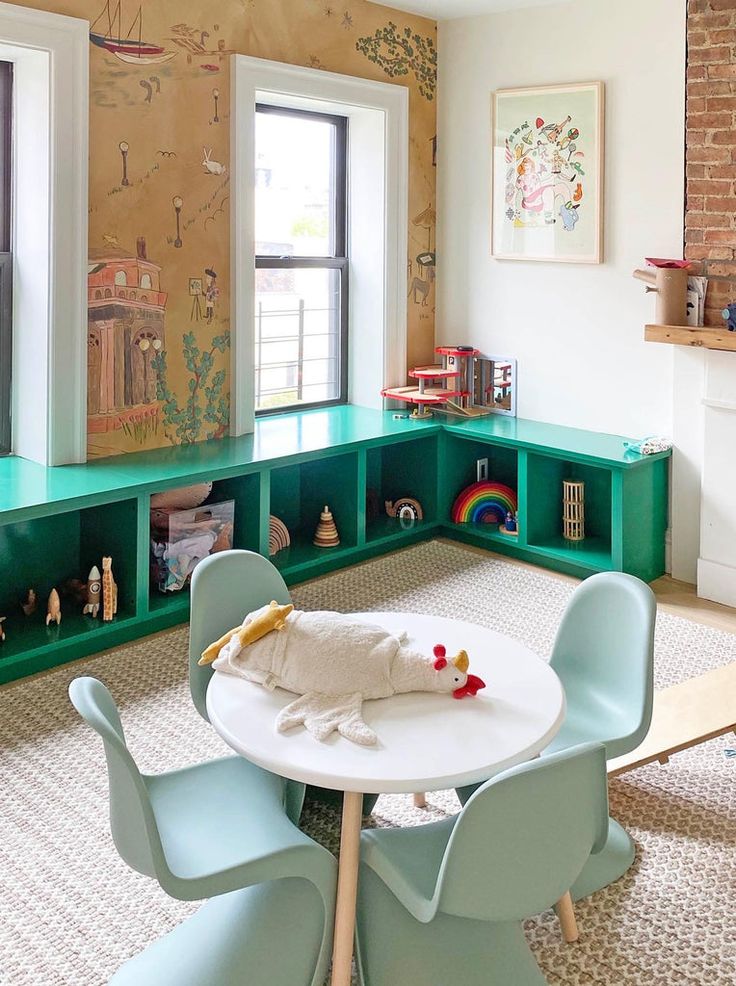 Modern, funky playroom with fun kids wallpaper.