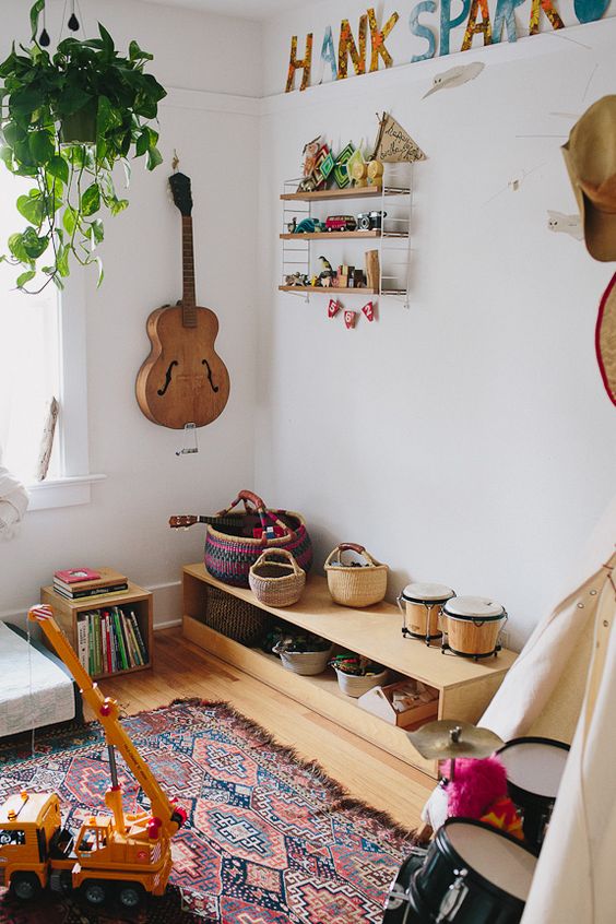 Boho, eclectic, and thrifted playroom ideas.